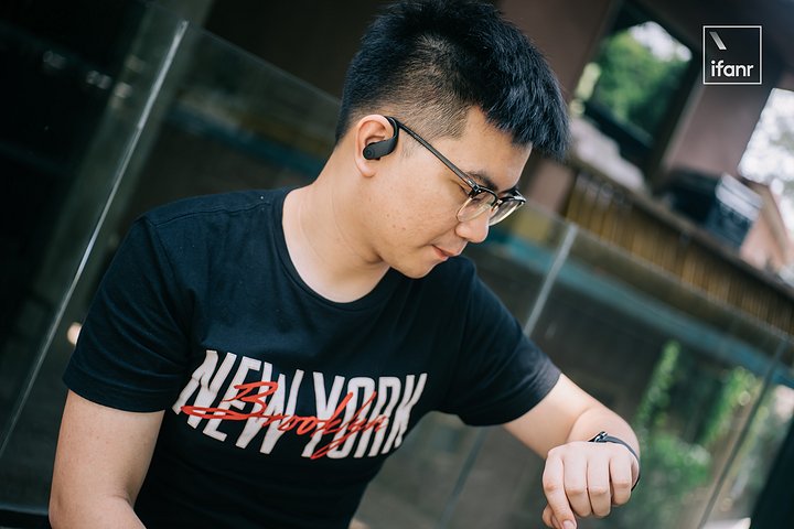 wearing powerbeats pro with glasses
