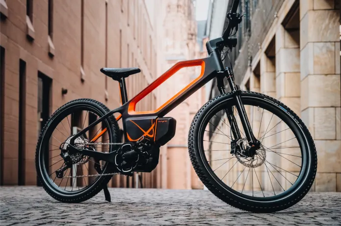 ASYNC H7 XC hybrid e bike with a 125 mile range and carbon fiber